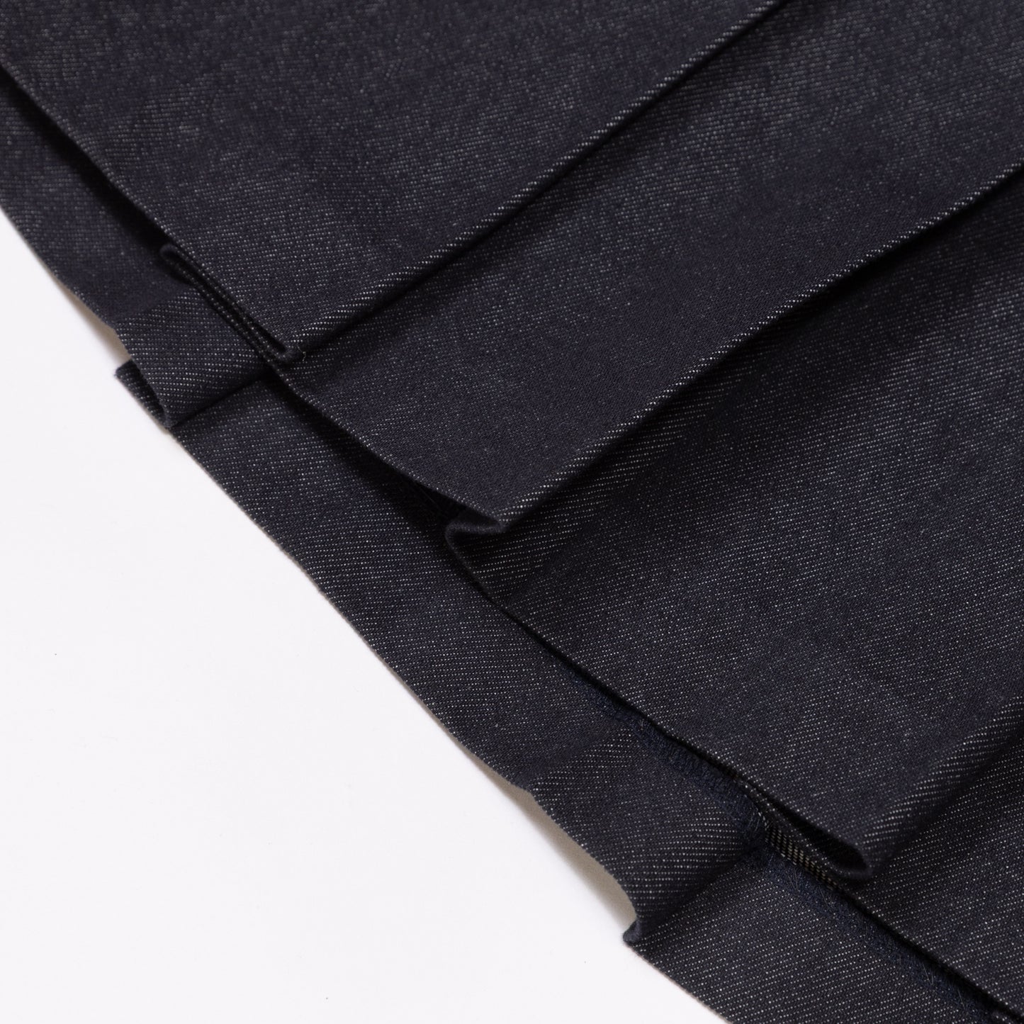 RAW DENIM PLEATED SKIRT