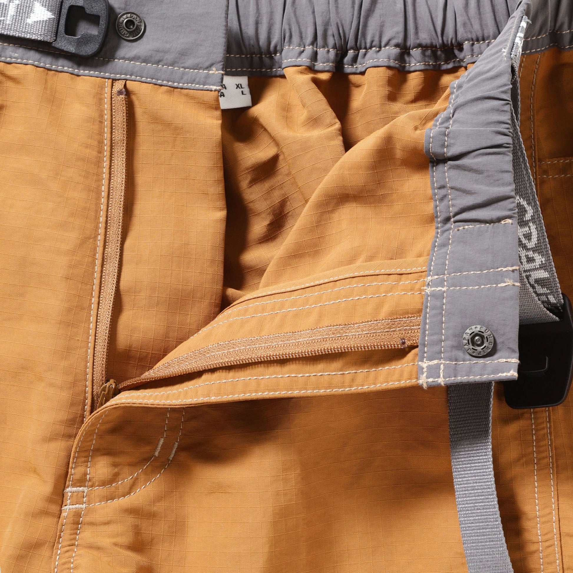 GRAMICCI X AND WANDER RIPSTOP VOYAGER PANT ORANGE