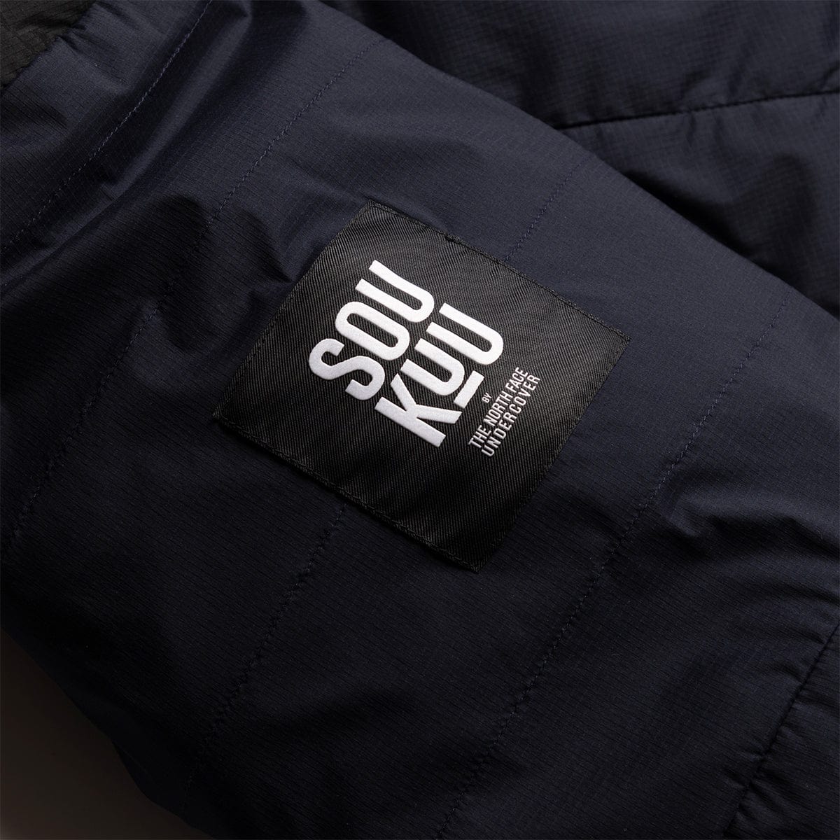 SOUKUU BY THE NORTH FACE X UNDERCOVER PROJECT 50-50 MOUNTAIN JACKET