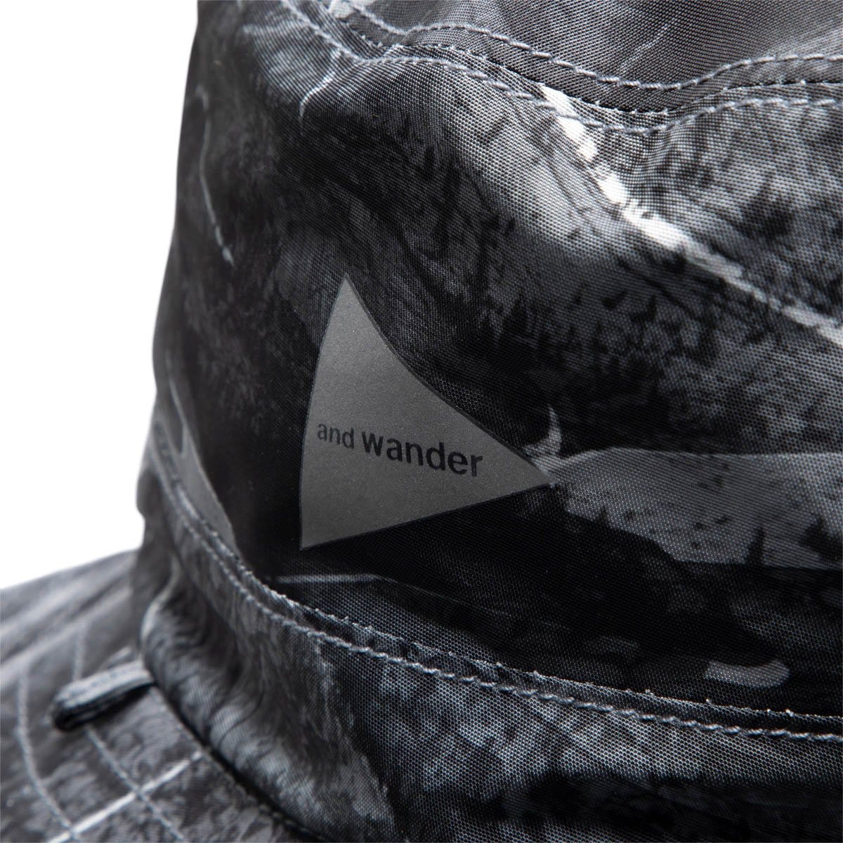 and wander Headwear BLACK / OS REVERSIBLE PRINTED HAT