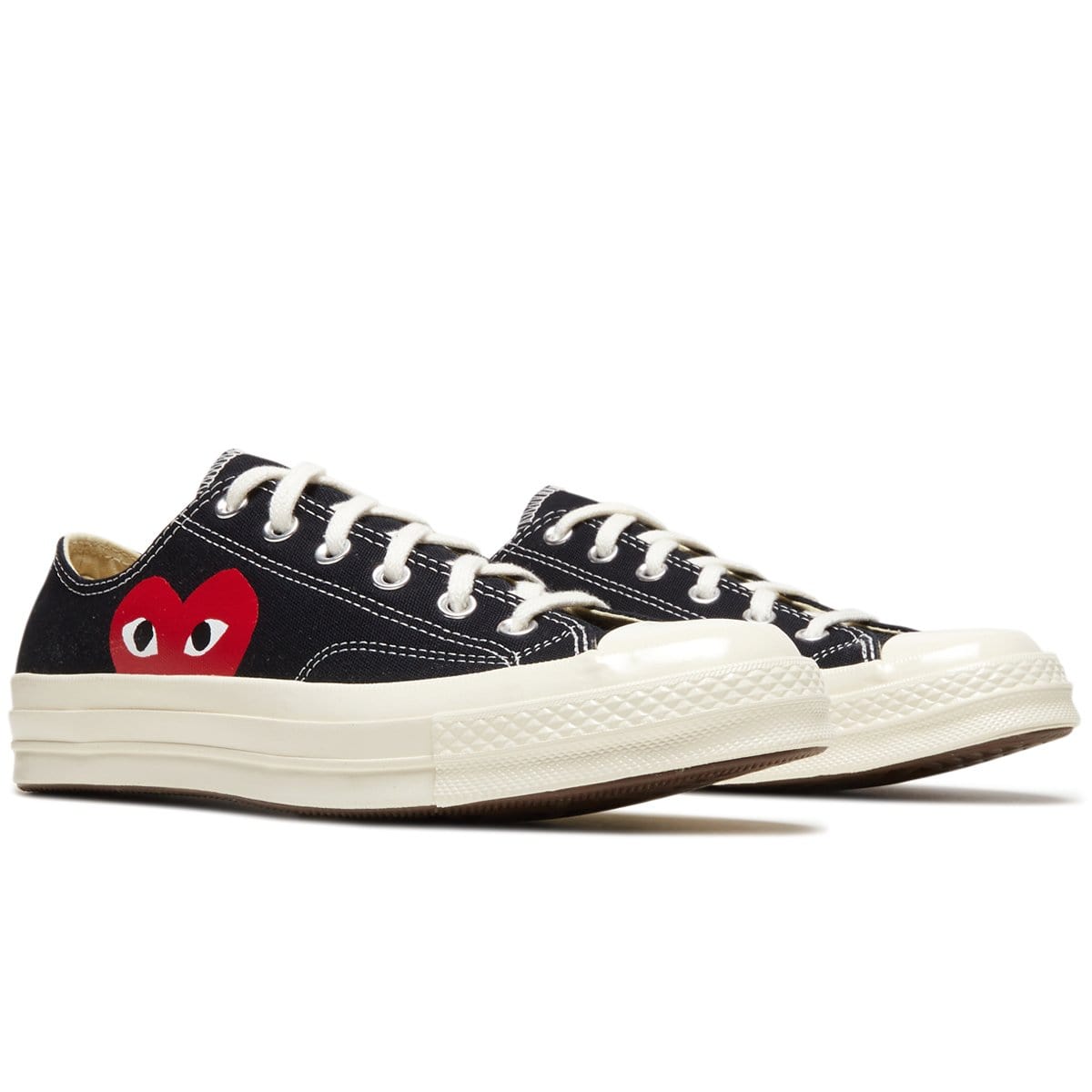 The Comme Des Garcons Play x Converse Sneakers That Are In Stores Now