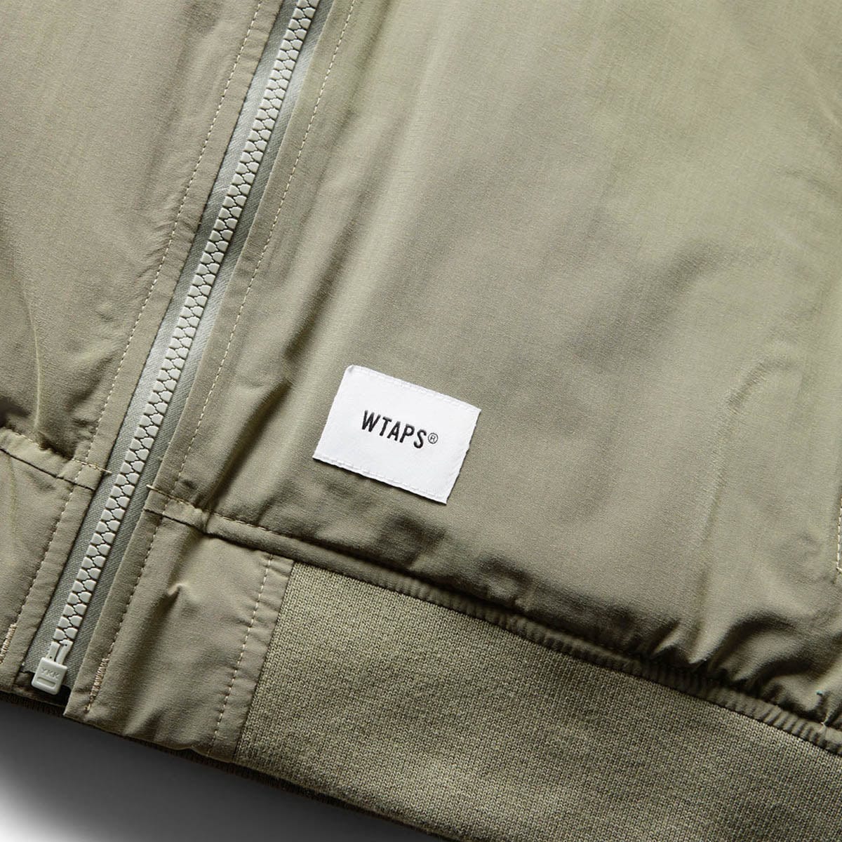 WTAPS logo-print zip-up Sport Jacket - Farfetch